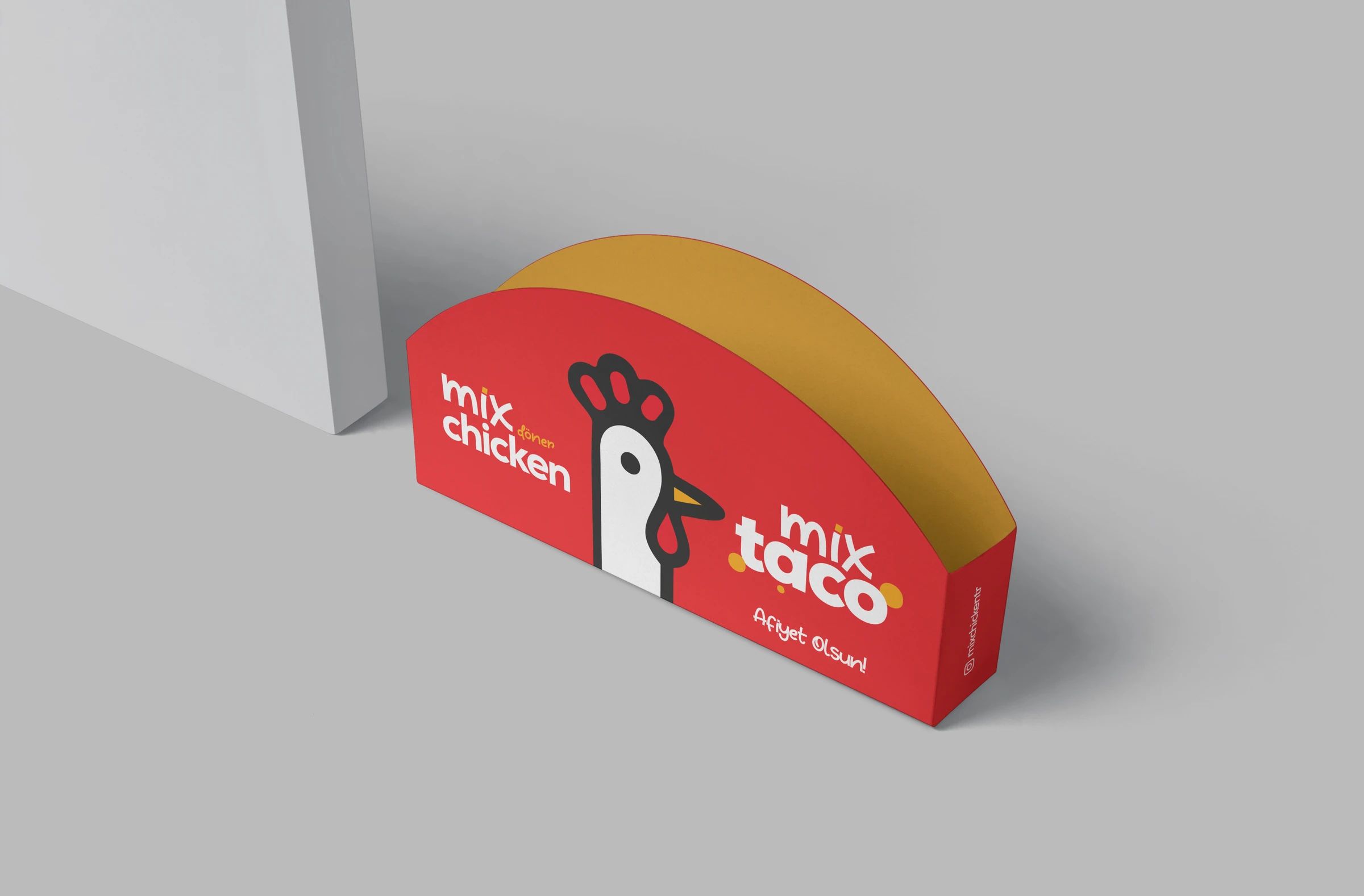 Red half-round taco holder with the chicken character and “mix taco”