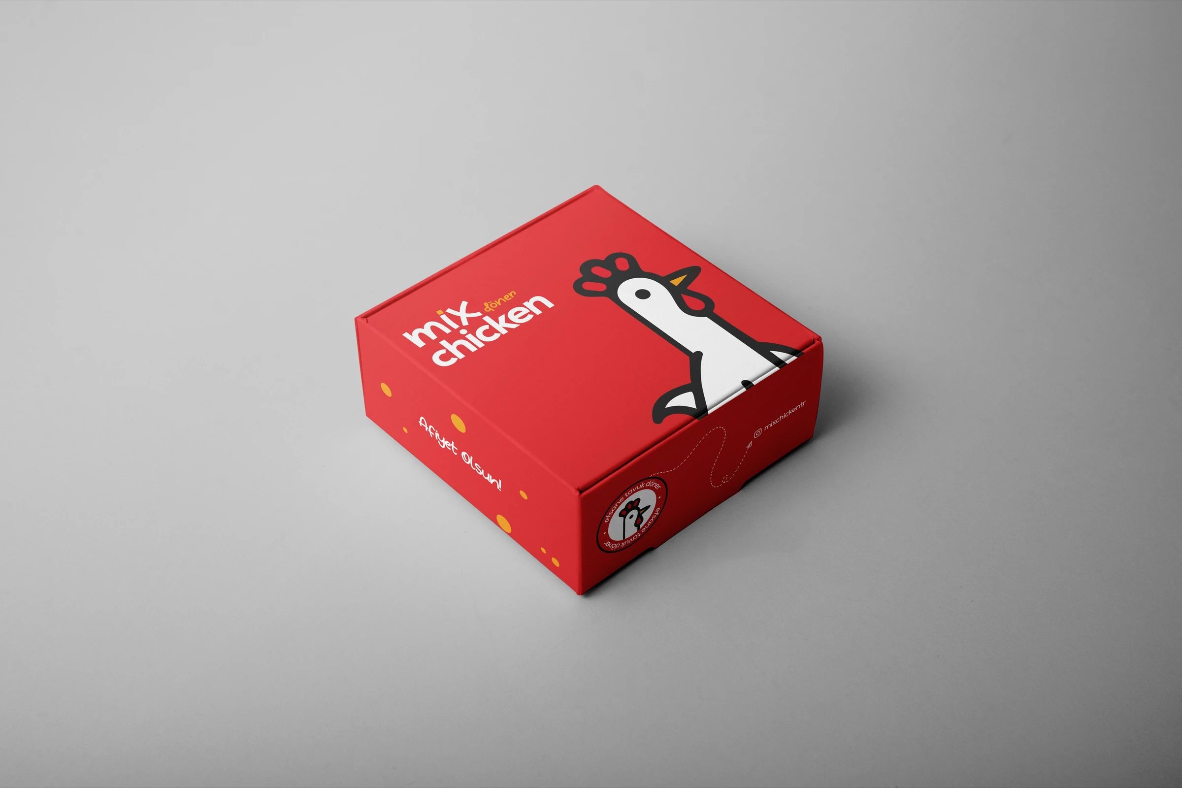 Red square box with the Mix Chicken logo, the chicken character and “Afiyet Olsun!” on its lid